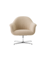 Front view of the Harbour Lounge Chair upholstered in light beige Baena 15 fabric with a polished aluminium swivel star base.